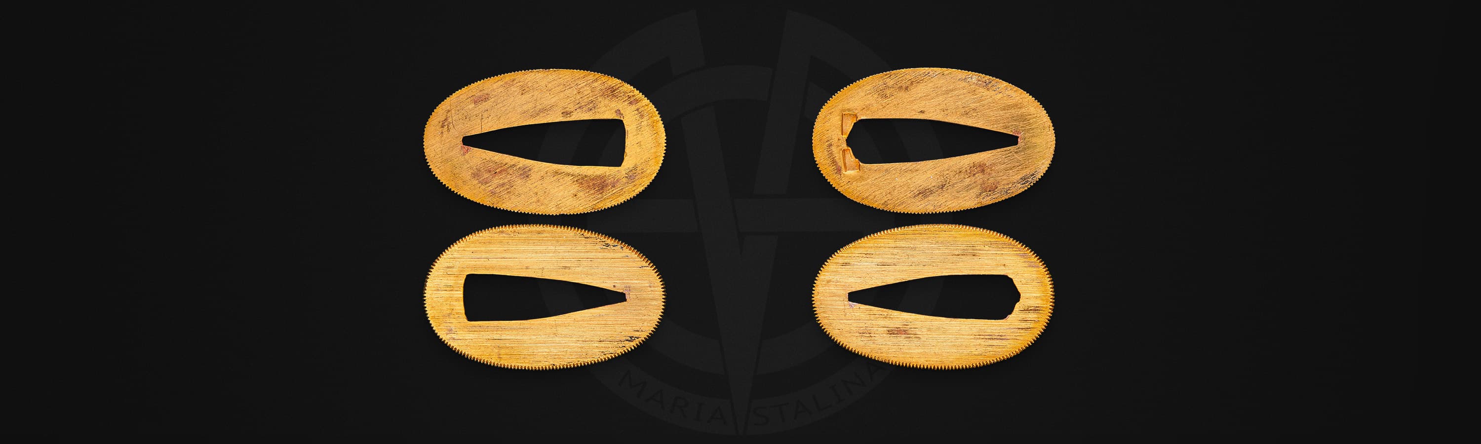 Menuki ornaments beneath katana wrapping