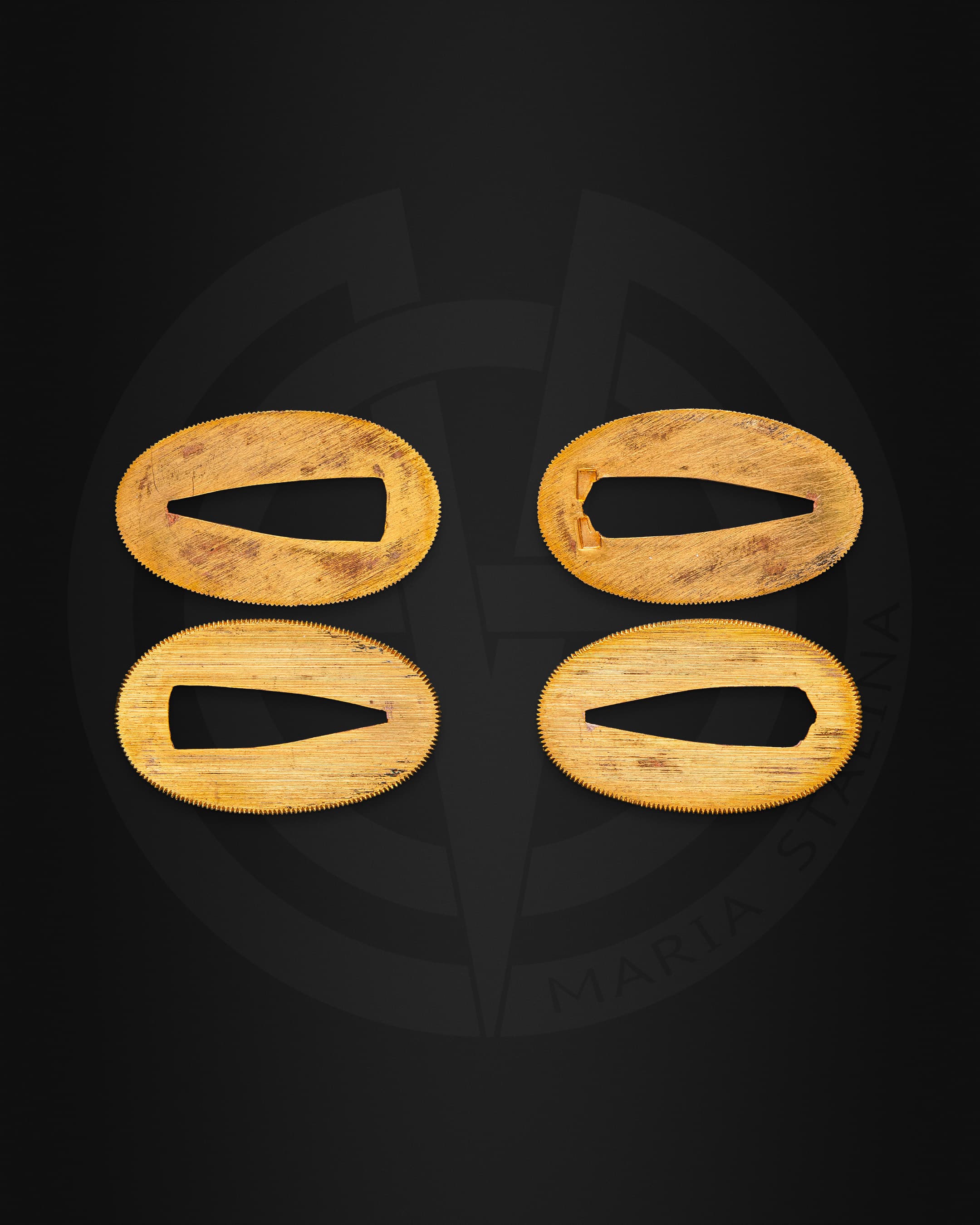 Menuki ornaments beneath katana wrapping