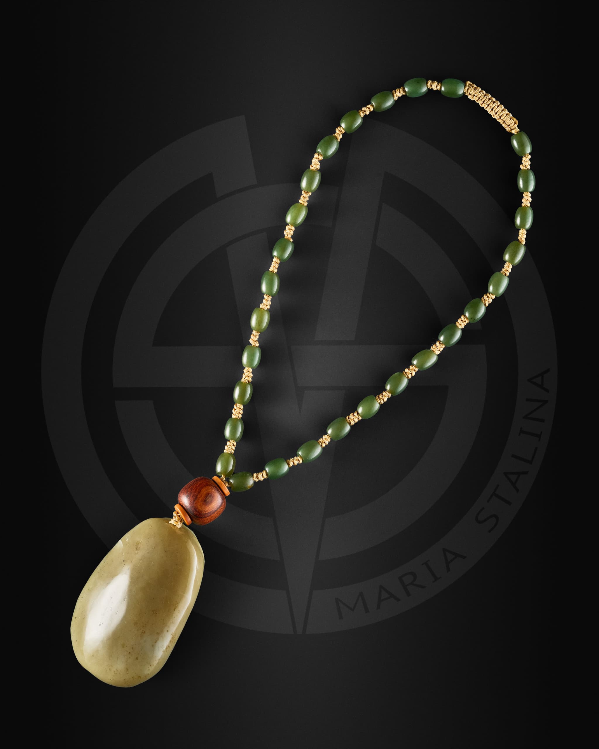 Back view of Yun Jin Luo jade amulet made of natural green jade