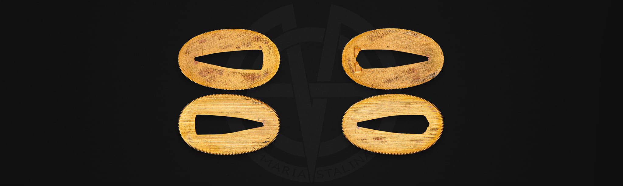 Menuki ornaments beneath katana wrapping