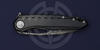 Рукоять кастомного ножа Sigil Black Marfione Custom Knives изготовлена из титана и покрыта чёрным DLC