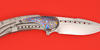 RWL-34 blade of Bodega Timascus Begg Knives