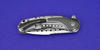 DLC coated titanium clip of Bodega Zirc Begg Knives