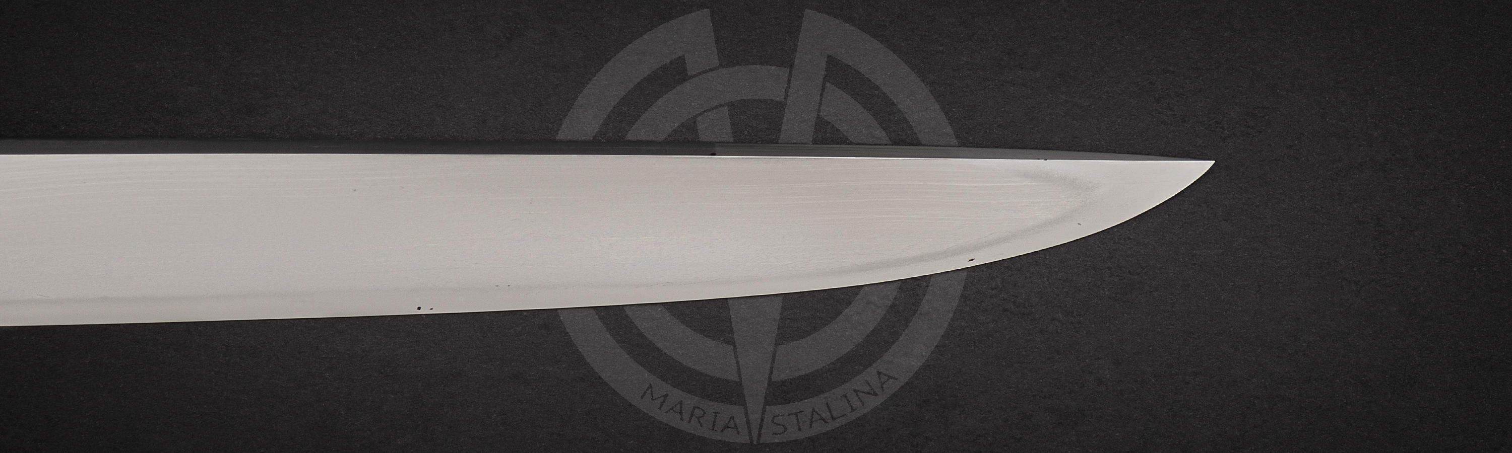 Slight reverse bend of the blade