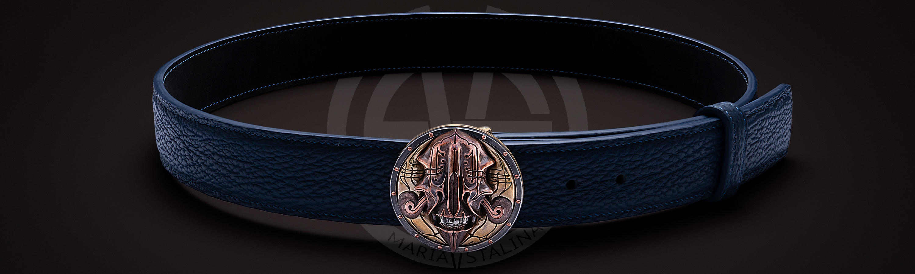 Men's belt with the author's buckle 