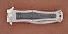 6AL4V titanium handle with carbon insert.
The original flipper knife HTM Madd Maxx 4