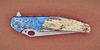 Mammoth ivory inlay of a handle of Raven knife by Cheburkov's Workshop